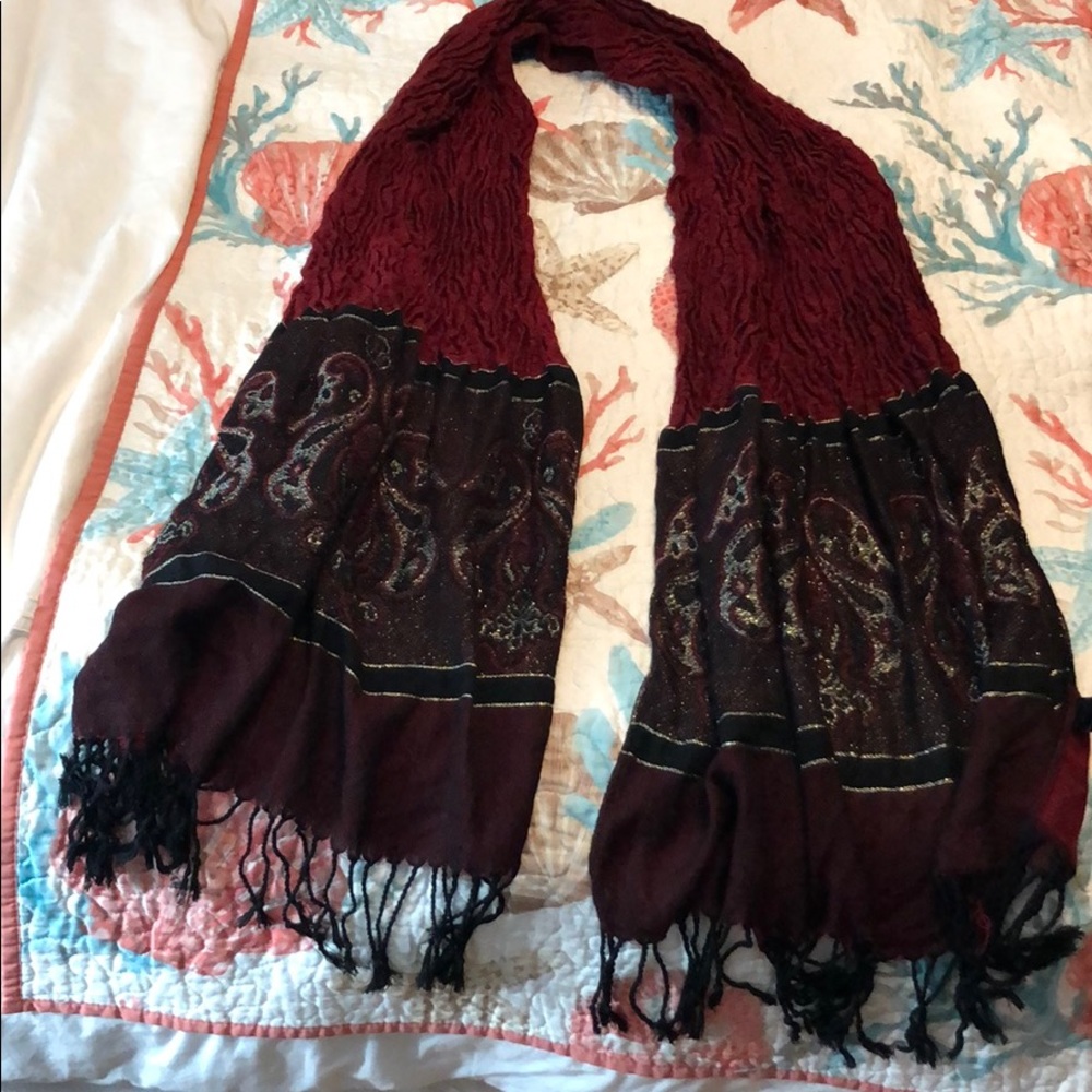 Deep red tasseled scarf with gold glitter.